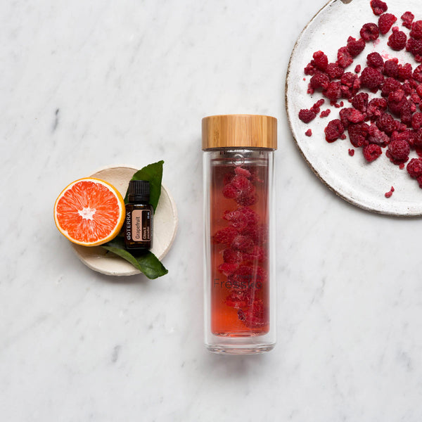 Raspberry and Grapefruit water infusion in glass fressko flask
